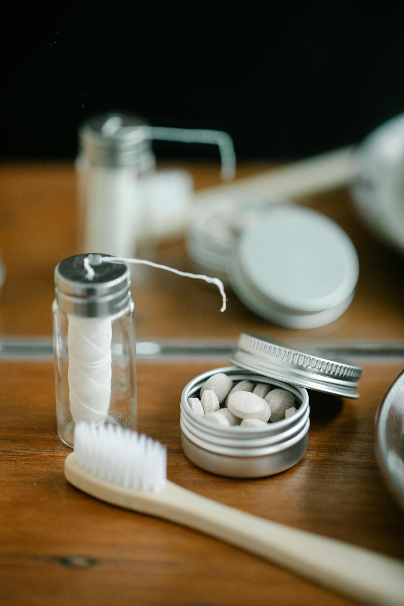 Discover eco-friendly oral hygiene tools on a rustic wooden surface, highlighting sustainability.